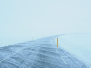 Snowy road during a blizzard. Heat things up through proactive marketing