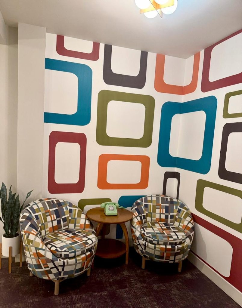 Lounge area with inspiring designs on the walls and chairs