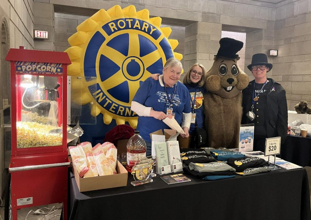 Groundhog mascot at a table station at the youngstown rotary groundhog beerfest