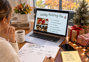A woman at her desk making a holiday marketing plan checklist